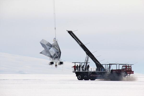 A balloon telescope has just been released from a crane on a launch vehicle in Antarctica.