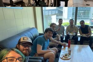 Top image of the entire group in a meeting, bottom image of most of  the group eating lunch