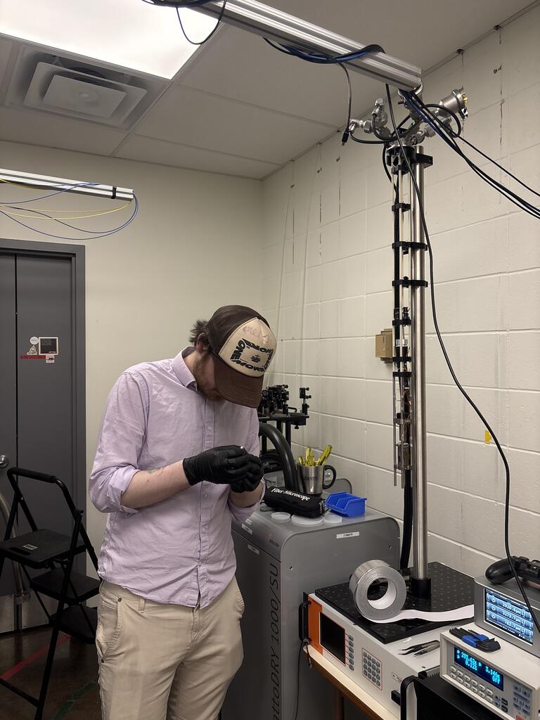 cedric working on the telescope