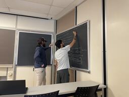 Juan and Cedric doing some math