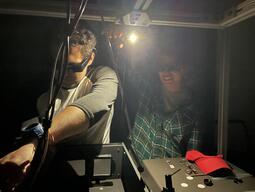 Ivanna and Tristan working on the set up