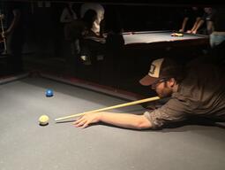 Cedric playing pool