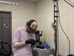 cedric working on the telescope