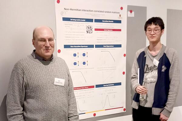 Don Kim at the poster session at the 21st Brunel-Bielefeld Workshop on Random Matrix Theory and Applications.