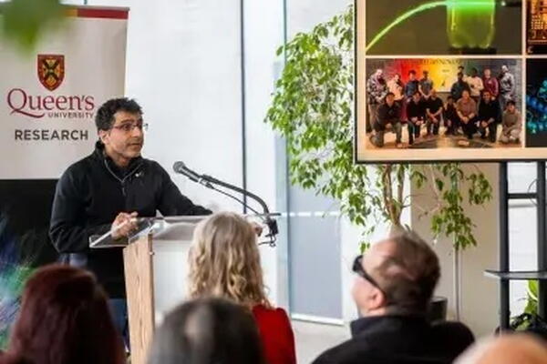 Prof. Shastri of Queen's Physics Department in Kingston, Ontario giving a talk at Applause: A Celebration of Research Excellence event, hosted by the Vice-Principal Research, Nancy Ross