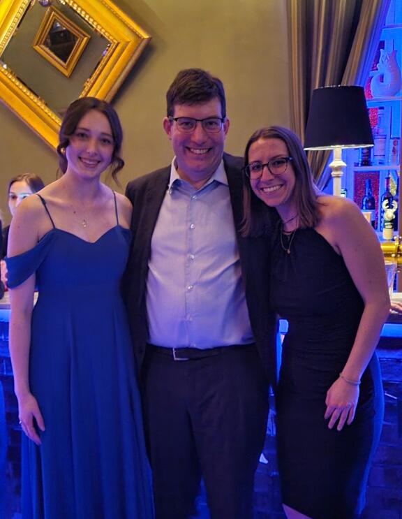 Department Head Rob Knobel having a great time at the banquet with Co-Presidents Rory Stinson (left) and Meghan Corbett (right). 