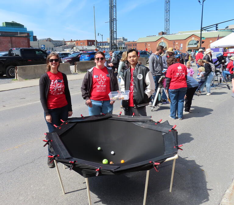 Another view of the gravity table with some of our volunteers at the 2026 Science Rendezvous Kingston.