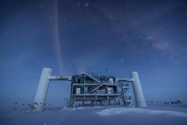 The IceCube Laboratory at the Amundsen-Scott South Pole Station, in Antarctica, hosts the computers collecting raw data. Due to satellite bandwidth allocations, the first level of reconstruction and event filtering happens in near real time in this lab. Only events selected as interesting for physics studies are sent to UW-Madison, where they are prepared for use by any member of the IceCube Collaboration. [Credit: Felipe Pedreros, IceCube/NSF]