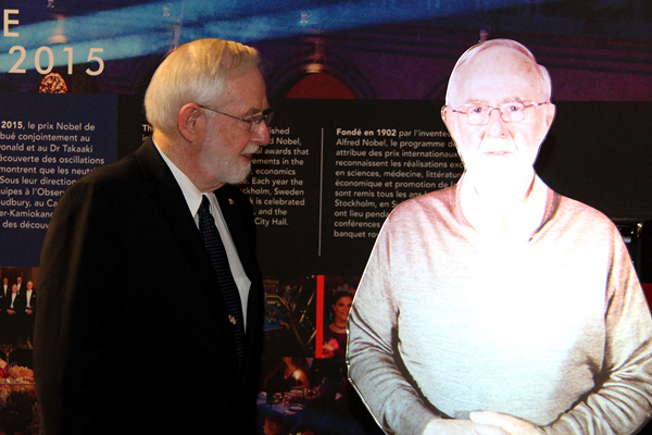 Professor Emeritus and Nobel Prize Laureate Art McDonald intrigued at the London House exhibit