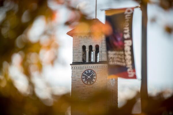 banner on campus that says "Queen's Research"