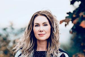 Elizabeth Goodyear grant outside wearing sweater