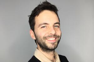 Olivier Jacques standing with arms crossed