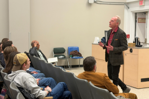 Wayne Cox speaks at his final lecture