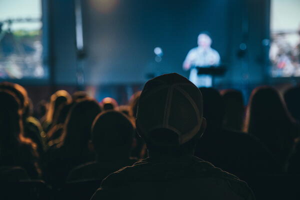 Audience at a conference presentation