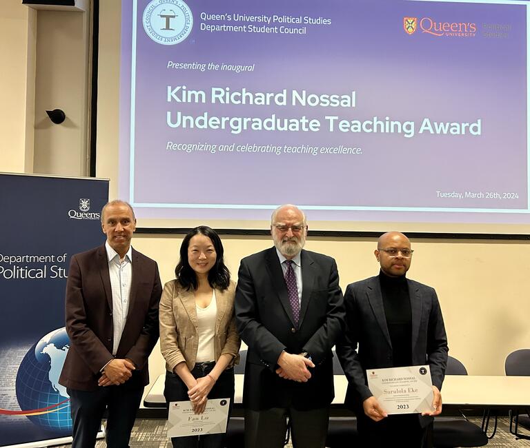 Award recipients, Fan Lu and Surulola Eke, with Head of Department Jonathan Rose and Kim Richard Nossal