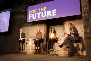 Four panelists on stage 