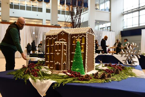 Gingerbread building and staff