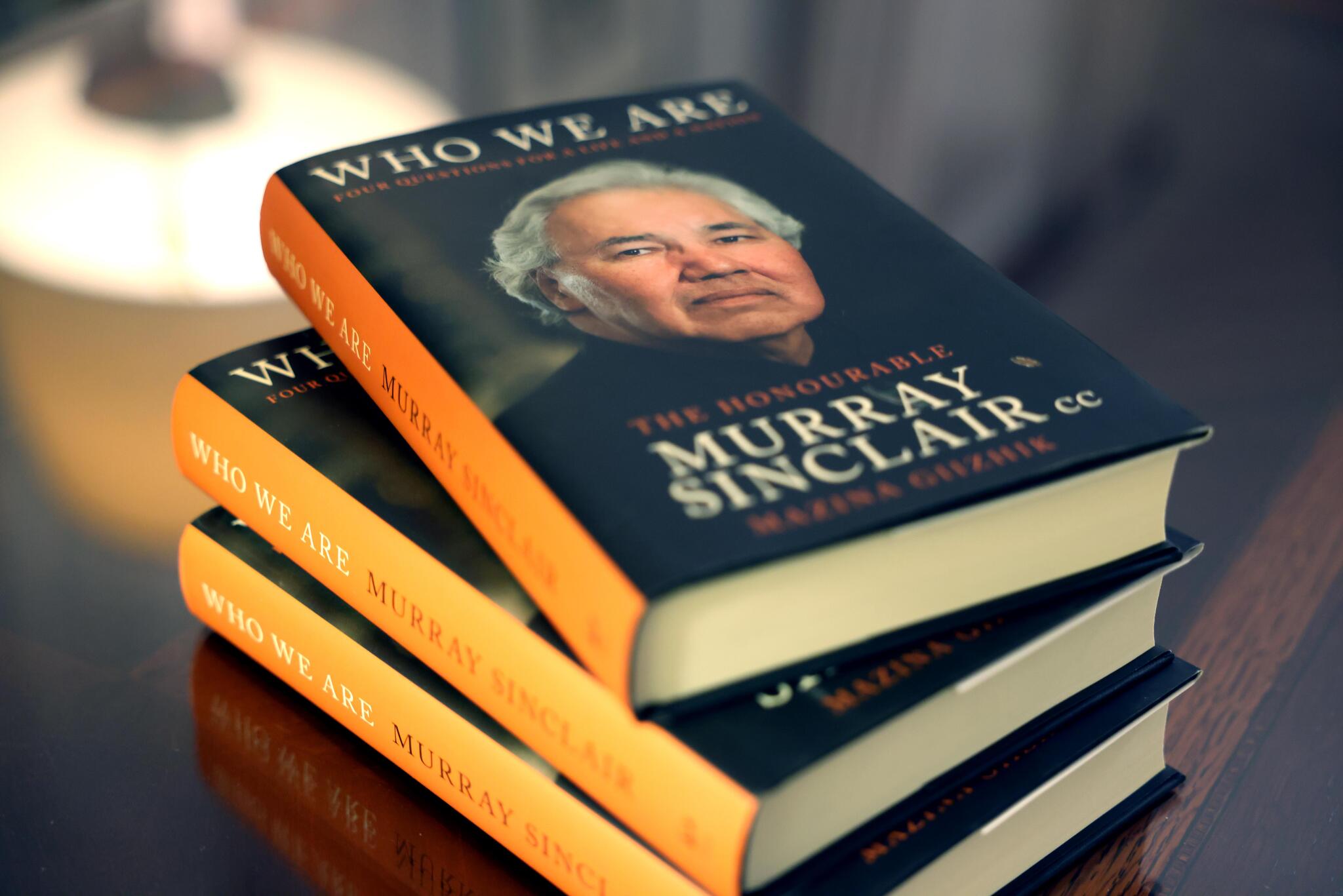 Three books on a table