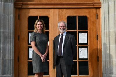 Minister Dunlop and Principal Deane standing side by side