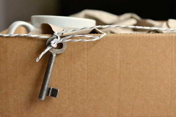 Cardboard box with a key on it