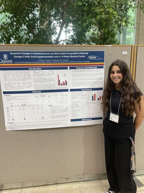 Sydney presenting her thesis proposal at OEP 2023. July 2023