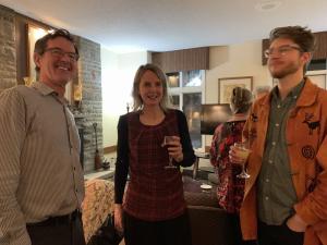 Three people having a conversation