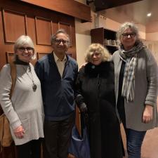 Four people smiling for a photo