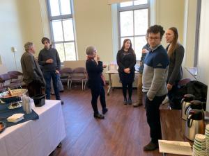 Multiple people talking in a room