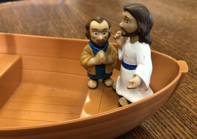 Jesus and a disciple on a boat