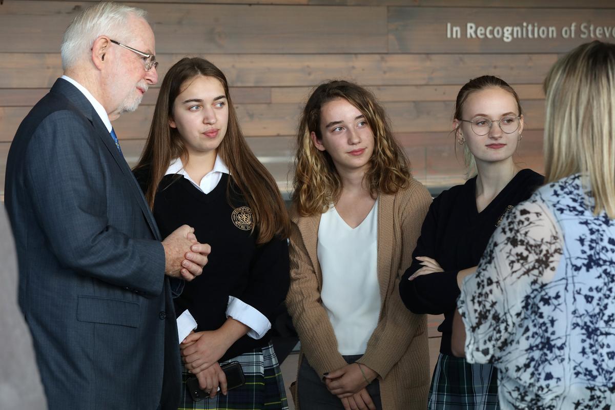 Queen's University's Nobel Laureate Arthur B. McDonald meets with audience members following the Nobel Prize Inspiration Initiative public discussion