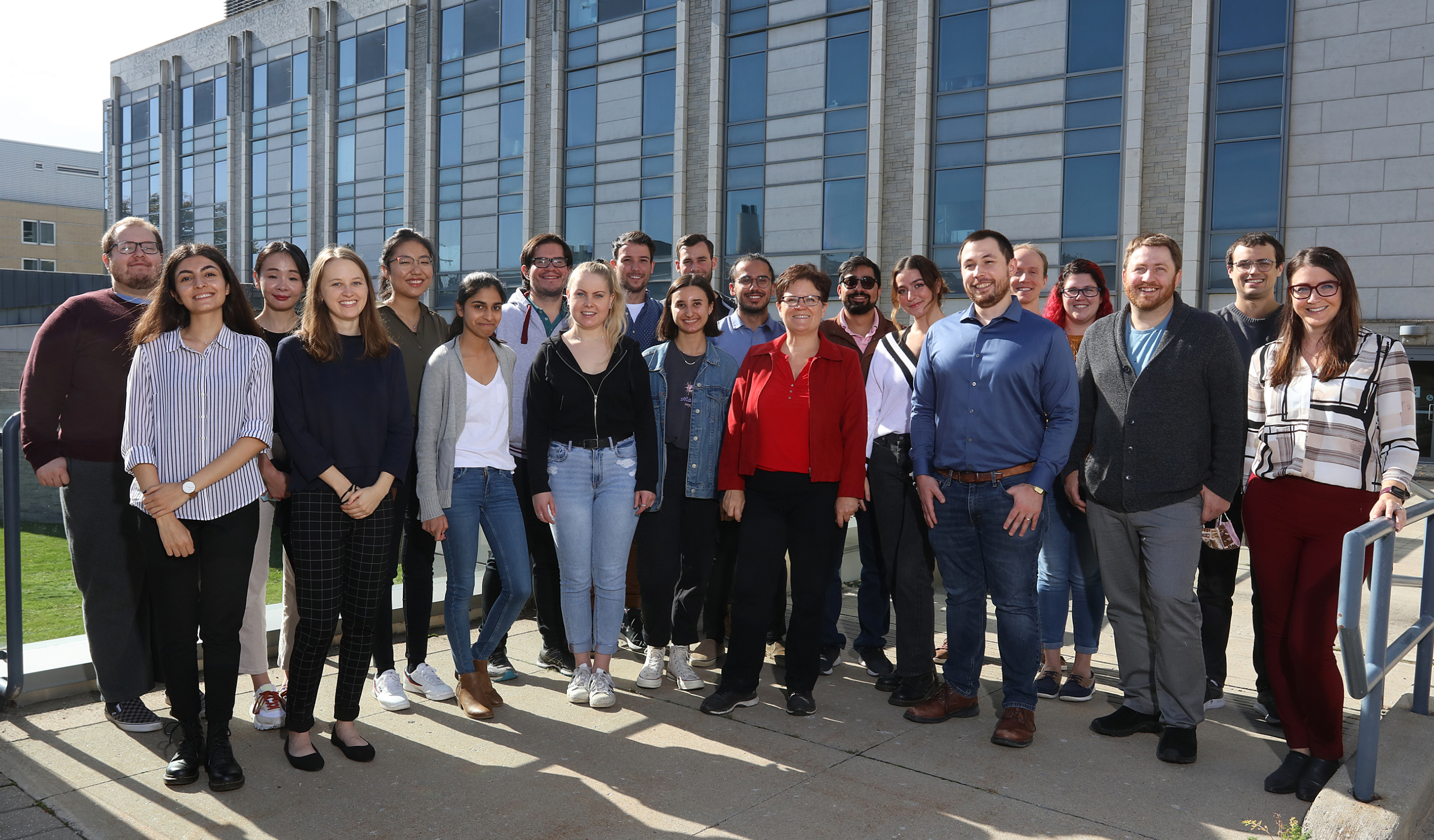 Dr. Cathleen Crudden (Chemistry) with her team of Queen's collaborators, lab members, and students. [Photo taken in accordance with COVID-19 protocols in effect at the time.]