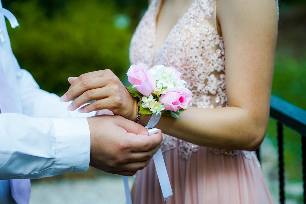 [Photograph of two people at prom]