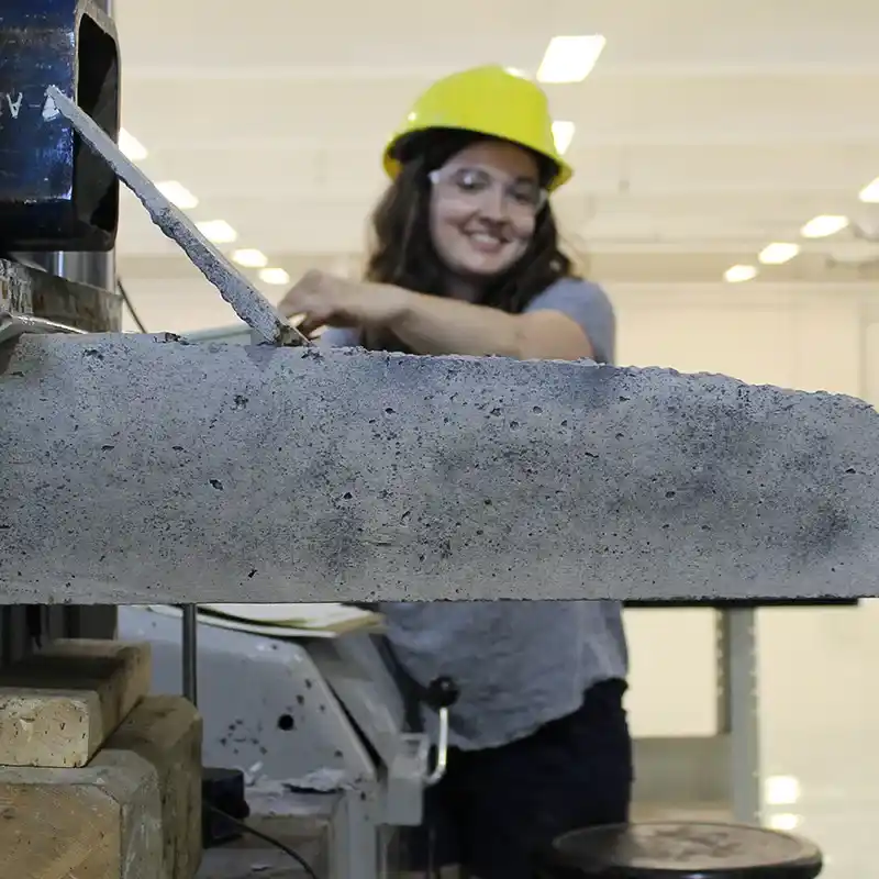 [researcher in safety helmet]