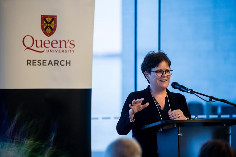 Cathleen Crudden speaking to the audience