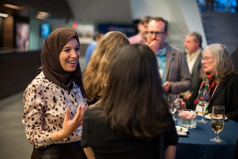 People in a crowd talking
