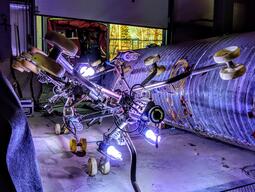 A UV light train being prepared to help rehabilitate a corrugated steel pipe