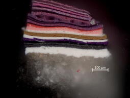 a microscope view of paint layers