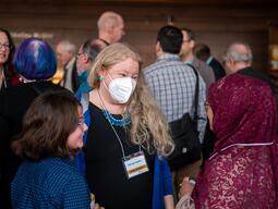 People in a crowd talking