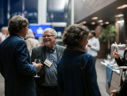 People in a crowd talking