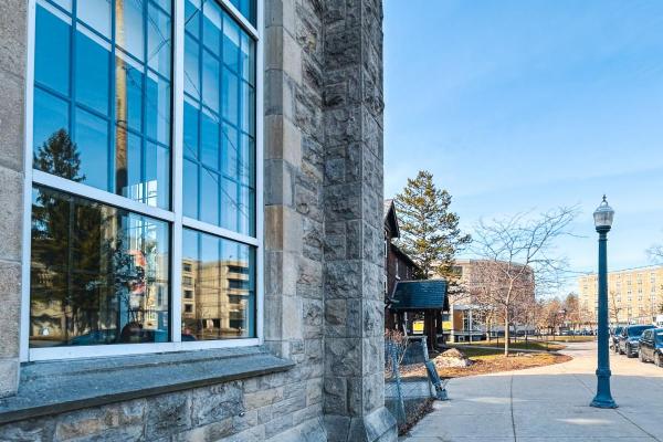 Ban Righ dining hall windows with Bader Lane in the background