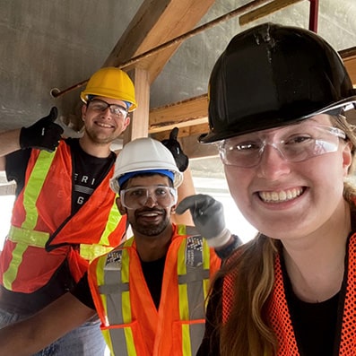 Three students working on new bridge in Kingston Ontario