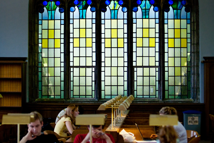 [Students studying at library desks in the 1923 Reading Room, also known as the Harry Potter Room, in Douglas Library. ]