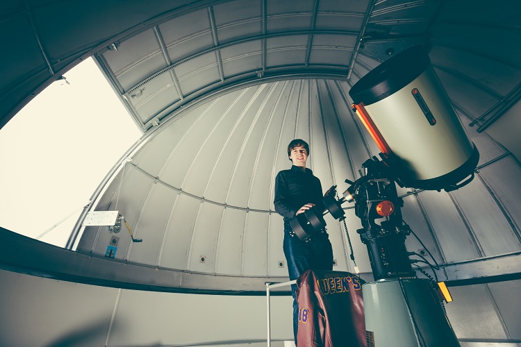 [Photo of Connor Stone at the Queen's Observatory]