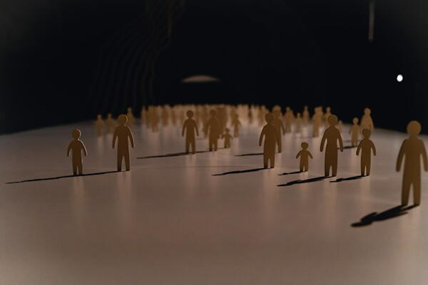 Paper cutouts of people and children