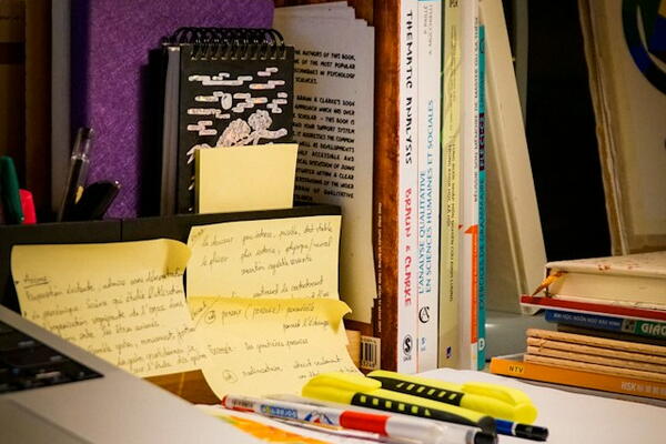 Books and notes on a desk