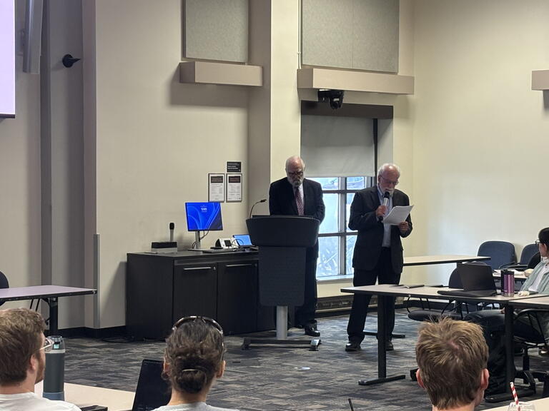 Kim Nossal and Robert Wolfe