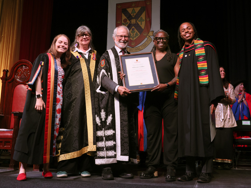Adrienne Coddett receiving Baillie award.