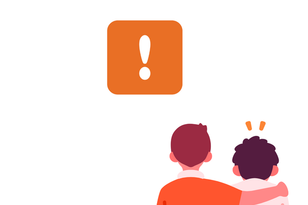 two people with arms around each other with orange exclamation point