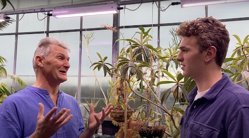 Olin Bailly with Professor Grogan in the greenhouse