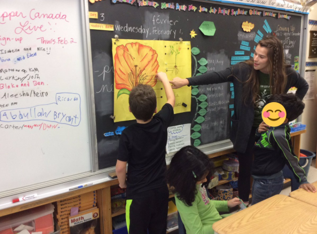 teacher and student in classroom
